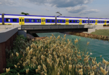 Stalen trogbrug - artists impression van de brug met trein erop