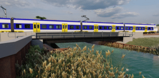 Stalen trogbrug - artists impression van de brug met trein erop