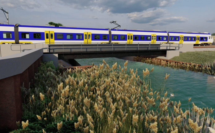 Stalen trogbrug - artists impression van de brug met trein erop